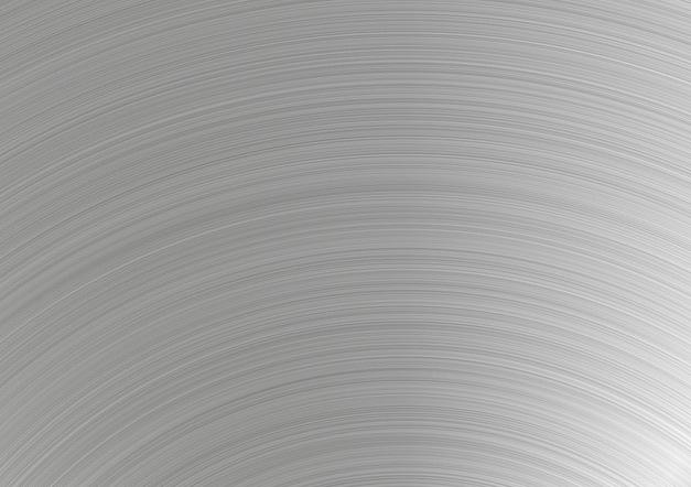 Oberflächenstruktur von Edelstahl Gebürstete Edelstahl-Oberfläche mit feinen kreisförmigen Strukturen für modernes und elegantes Design.